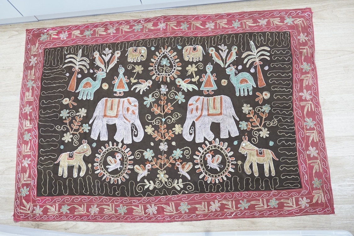 A Sumbanese shoulder cloth, an Indian chain stitch panel and a finely woven silk stole